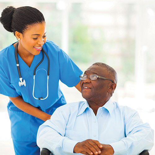 Nurse assisting a patient in hosiptal