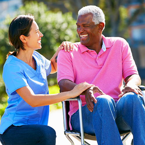 Assistant taking a patient for a walk